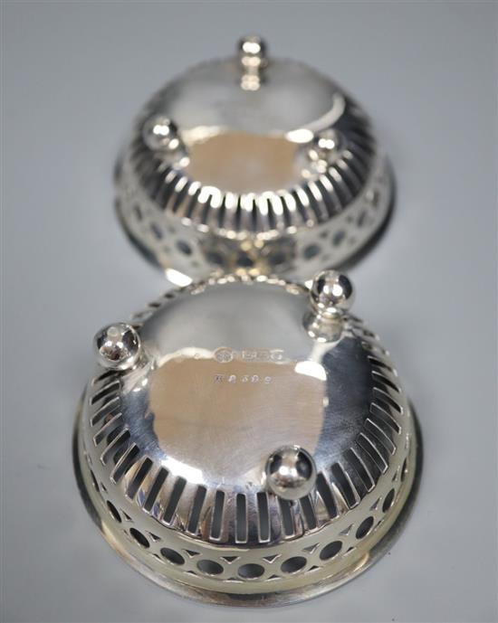 A Persian white metal bowl, a Victorian silver sugar bowl, pair of small silver nut dishes and a small silver bowl, gross 7.5 oz.